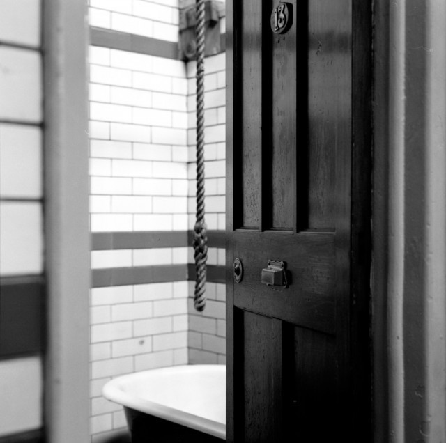 Photo: First class 'slipper baths' - the rope is to help the bather pull themselves out of the bath. These public baths were in use until quite recently.