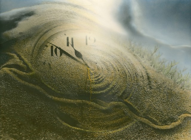 Photo: The circular grooves in the sand created by some roots exposed on the beach note the passage of time, and the temporary qualities of life. The trail of some small critter passes thru, all will soon be erased by wind or tides.