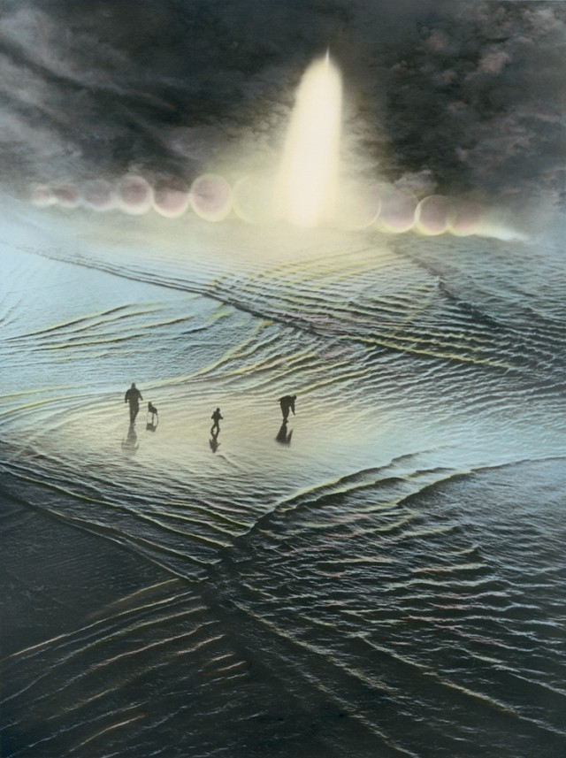 Photo: Beach walkers explore the echoing waves at low tide. Perhaps they will find the vibe they seek.