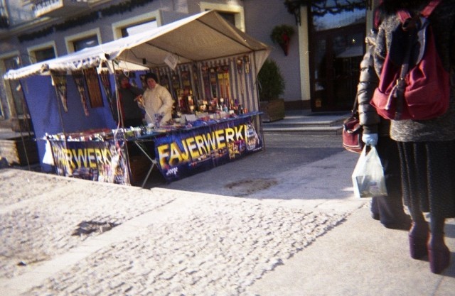 Photo: Women selling fireworks didn't have many customers so they gossiped about the shoes...