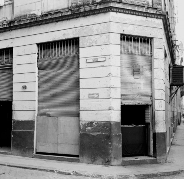 Photo: There are many of these simple street-corner food stores throughout Havana. There is typically a simple menu just inside the window and customers are served through the hatch. They never seemed to be particularly quiet.